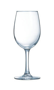 A clear glass wine glass with a wide bowl, slender stem, and flat circular base, shown on a plain white background.